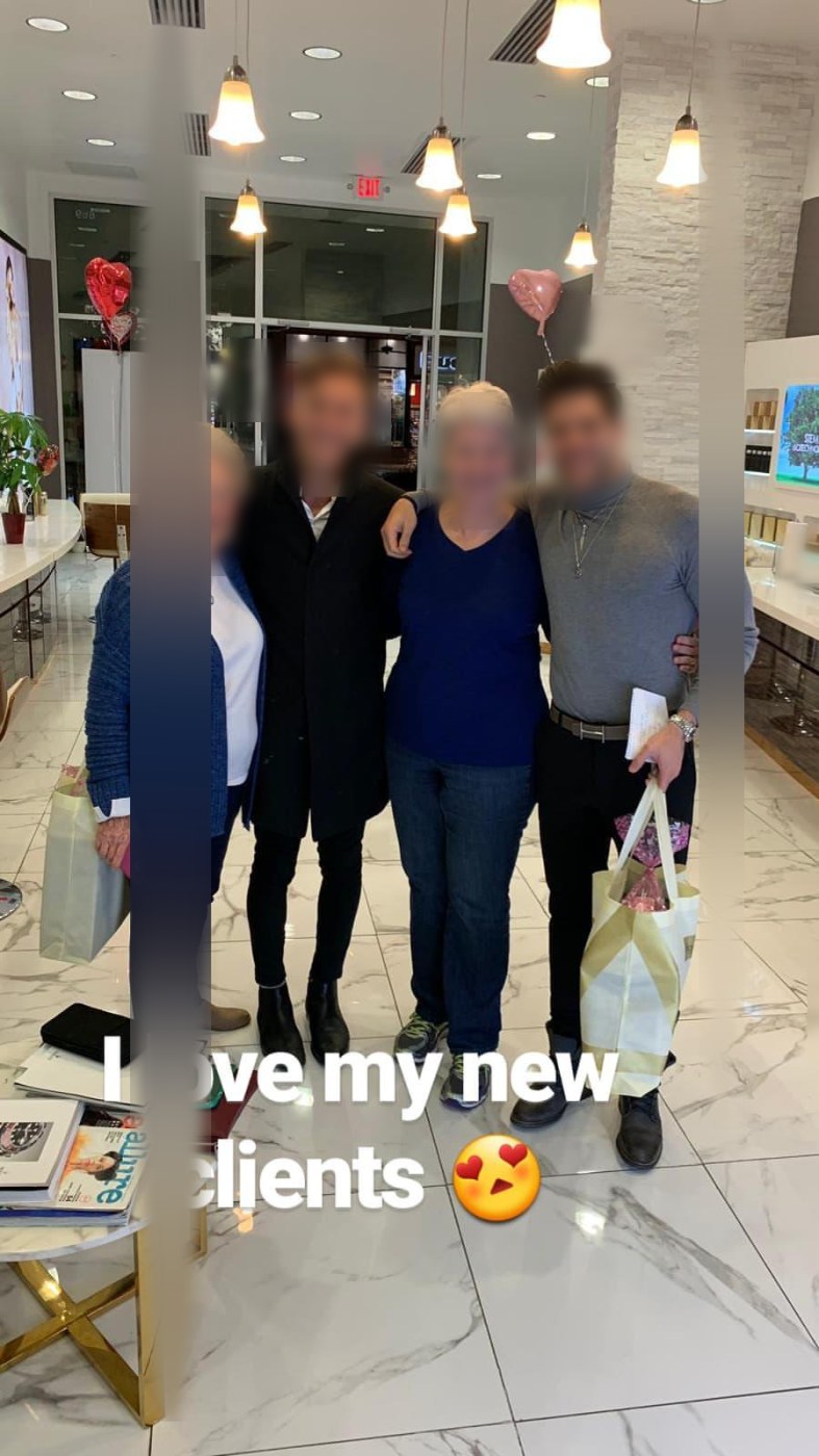 Sales team with customers inside the store